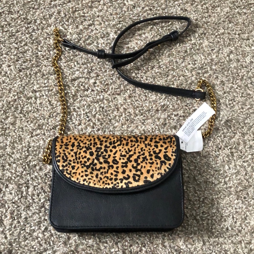 Small leopard and black purse